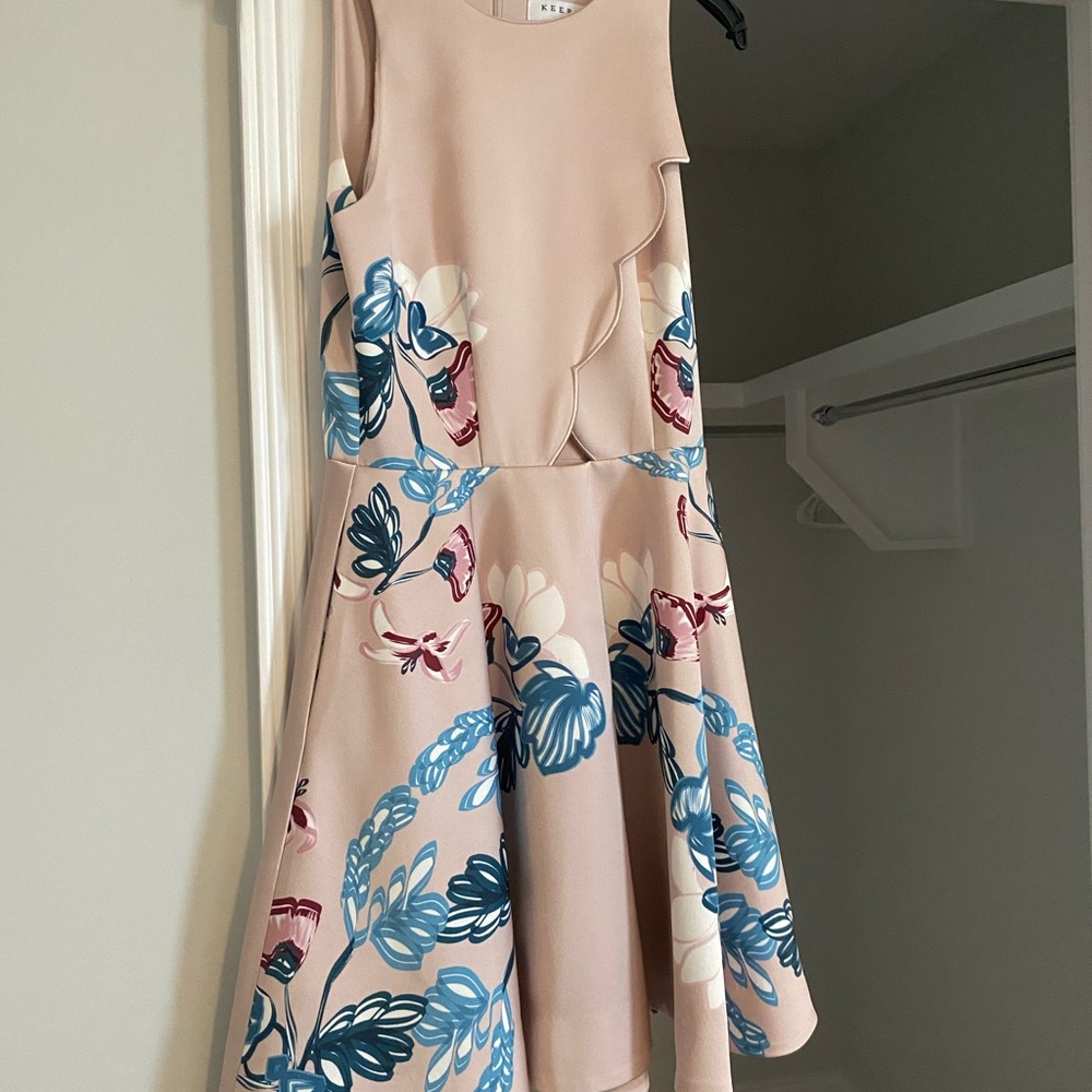 Sleeveless Keepsake boutique dress with cut-out and pockets; size small